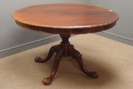 Georgian style reproduction mahogany centre table, circular top with carved moulded edge,