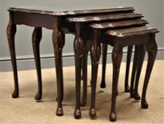 Regency style figured mahogany quartetto of nesting tables, glazed tops, with cabriole supports,