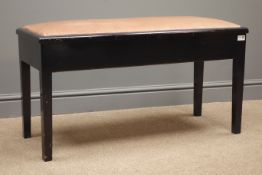 Early 20th century ebonised duet piano stool, upholstered hinged seat, square tapering supports,