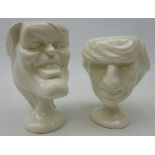 Two white glazed Fluck & Law 'Spitting Image' egg cups modelled as Diana & Fergie,