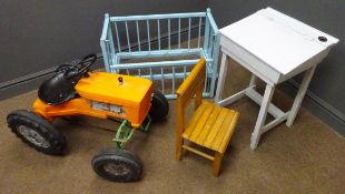 Childs Tri-ang pedal tractor, orange plastic moulded body, black wheels and black metal seat,