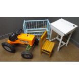 Childs Tri-ang pedal tractor, orange plastic moulded body, black wheels and black metal seat,