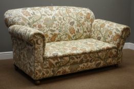 Victorian two seat drop-end sofa upholstered in floral beige ground fabric, W160cm,