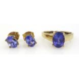 14ct gold oval tanzanite ring, hallmarked and pair of silver-gilt tanzanite stud ear-rings,