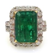 18ct gold emerald and diamond cluster ring, emerald approx 6.9 carat, diamonds approx 0.