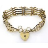 9ct gold five bar gate bracelet, hallmarked heart shape lock approx 10.