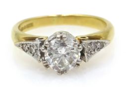 Single stone diamond gold ring, with diamond set shoulders,