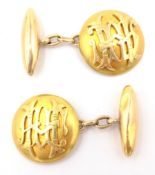 Pair of gold cuff-links, relief decoration, tested 14ct, approx 12.