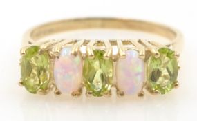 9ct gold peridot and opal, five stone ring, hallmarked Condition Report Approx 1.