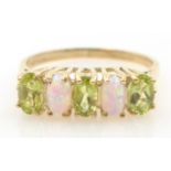 9ct gold peridot and opal, five stone ring, hallmarked Condition Report Approx 1.