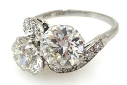 White gold two stone diamond cross-over ring with diamond shoulders, main diamonds approx 1.