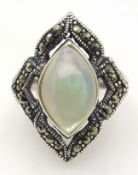 Mother of pearl and marcasite silver ring stamped 925 Condition Report <a