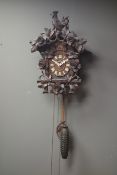 Early 20th century Black Forest style cuckoo clock, with cockrill pediment,