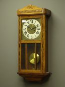 Early 20th century stained beech wall clock, twin train movement,