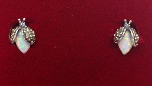 Pair of silver opal and marcastie insect ear-rings Condition Report <a