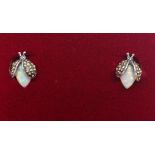 Pair of silver opal and marcastie insect ear-rings Condition Report <a