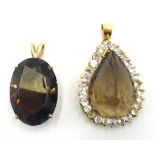 Gold smoky quartz pear shaped cluster dress pendant stamped 18kt and a similar pendant hallmarked