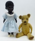Pedigree black baby walker doll, with sleeping eyes, H40cm and a gold plush Teddy with glass eyes,