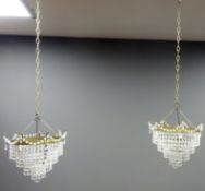 Pair of gilt metal and cut glass four tier chandelier light shades,