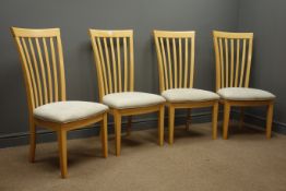 Four high back beech dining chairs, upholstered seats, square tapering supports.