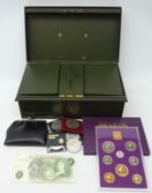 Great British coins in a green painted metal strong box; Page one pound note 'DY08',