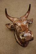 Large cast metal wall hanging bust of a bull,