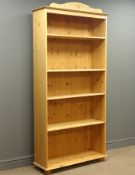 Ikea pine bookcase fitted with five shelves, W85cm, H189cm,