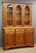 Ducal polished pine dresser, three drawers and three panelled cupboards,