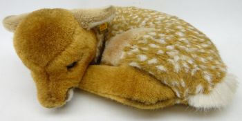 Steiff plush model of a recumbent deer faun, with Steiff ear button,