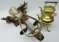 Two brass spirit kettles, one lacking burner and wrought metal candle wall sconce,