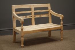 Child's bench, carved and pierced back supports, reeded arm rests, turned and fluted supports,