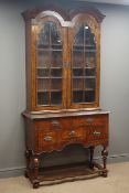 19th century Queen Anne style figured walnut twin arched cabinet on stand,