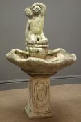Composite stone three piece water fountain, shell and male statue holding vase, W70cm, H115cm,