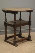 Early 20th century oak monks chair, guilloche carved tilting back, turned supports,