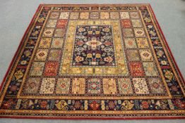 Square Persian rug, blue ground, red border, W275cm,