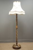 Oak barley twist standard lamp and floral patterned shade, circular on bun feet,
