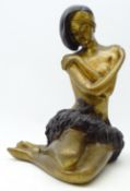 Cast metal figure of a seated semi nude woman,