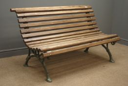 Cast iron green finish garden bench with wooden slats,