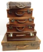 Four leather graduated suitcases largest W66cm and two others Condition Report