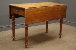 Early 20th century mahogany Pembroke drop leaf table, single drawer, turned supports on brass cups,