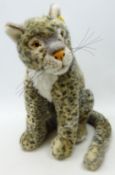 Modern Steiff figure of a seated Mountain Leopard,