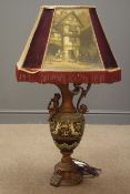 Large Italian gilt metal and moulded pottery table lamp in the form of a cherub mounted ewer with