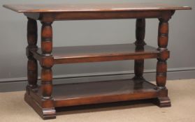 Mahogany three tier console table, four turned supports two sledge feet, W55cm, H81cm,