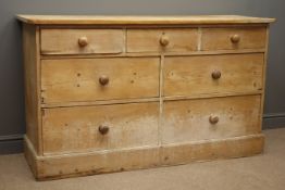 Victorian pine chest with three short and four long drawers on plinth base, W153cm, H89cm,