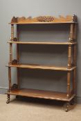 Victorian walnut bookcase, raised shaped and pierced back,