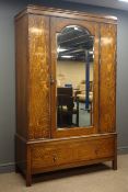 Early 20th century oak single wardrobe enclosing by single mirror glazed door,