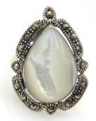 Silver mother of pearl and marcasite stamped 925 Condition Report <a
