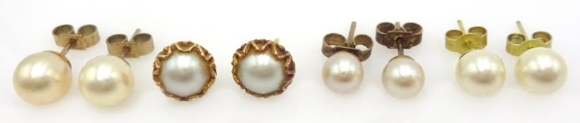 Two pairs of 9ct gold pearl stud ear-rings boxed and two other pairs Condition Report