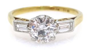 Diamond and baguette diamond 18ct gold ring, main diamond 0.