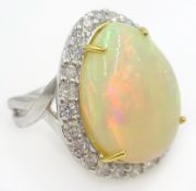 18ct white gold pear shaped opal and diamond cluster ring, stamped 750, opal approx 10.